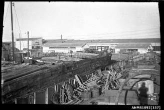 This image captures the view of a ships fore deck under repair or construction