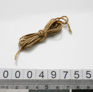 Brown string or twine from sewing kit used by John Berchmans Kiley on HMAS TINGIRA