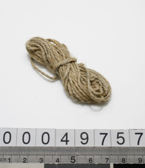 Brown string or twine from sewing kit used by John Berchmans Kiley on HMAS TINGIRA