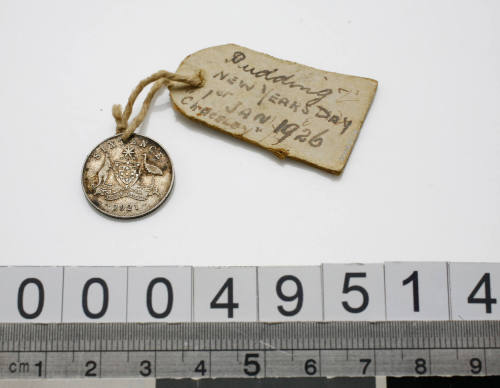 1921 Australian sixpence coin with attached label