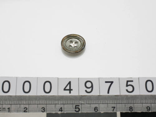 Silver button from sewing kit used by John Berchmans Kiley on HMAS TINGIRA