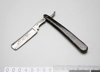 Cut-throat razor with tortoiseshell handle