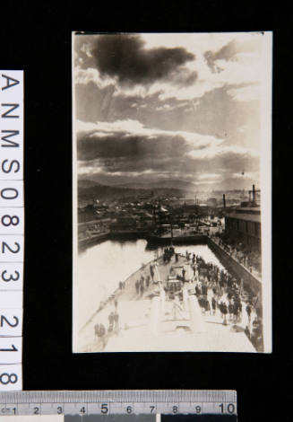 Postcard depicting aerial view of HMAS SYDNEY docked