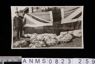 Silver gelatin photograph depicting Naval official with British flag