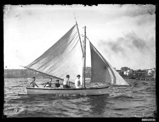 Small half-decker sailing on Sydney Harbour