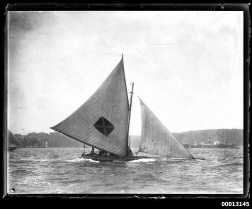 18-foot skiff under sail on Sydney Harbour