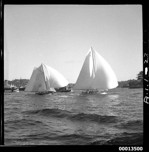 18-foot skiffs TARUA and ALSTAR II sailing near Clark Island, Sydney Harbour