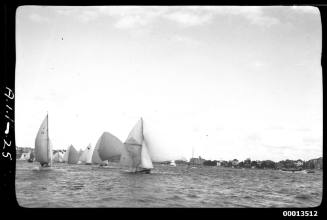 MYRA TOO experiencing a ringtail jam during a heat of the 1951 World's 18-foot skiffs Championship, Sydney Harbour