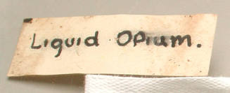 Bottle label reading 'eucalyptus oil' and 'liquid opium'