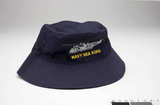 Navy blue bucket hat commemorating the 817 Squadron and Sea King helicopter