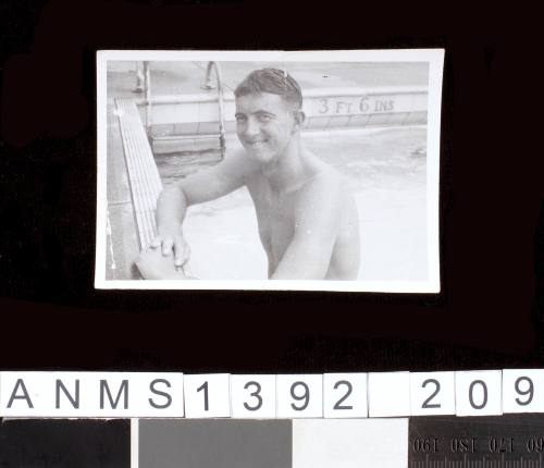 A young man in a swimming pool at Townsville