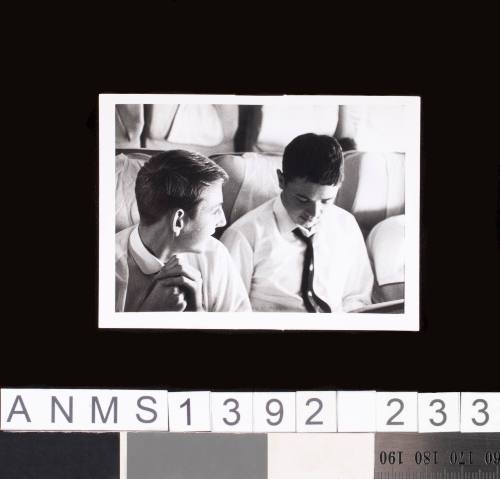 Peter Reynolds and Peter Tonkin on an aeroplane en route to the 1964 Tokyo Olympic Games