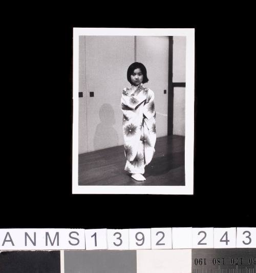 A girl in a traditional Japanese Kimono, taken during the 1964 Tokyo Olympic Games