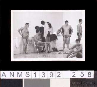 Swimmers, including Australian Allan Wood, resting at the 1964 Tokyo Olympic Games