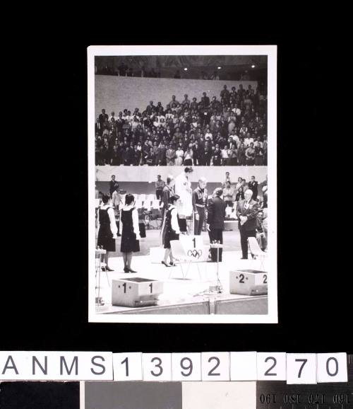 Dawn Fraser receiving a gold medal at the 1964 Tokyo Olympic Games