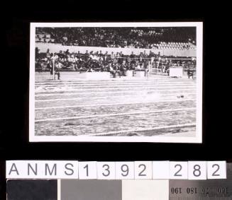 Spectators watching an event at the 1964 Tokyo Olympic Games pool