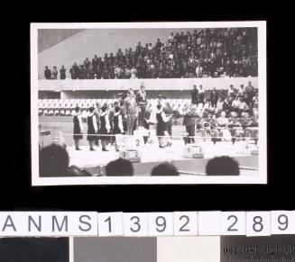 Swimmers receiving medals for the 4x200m relay at the 1964 Tokyo Olympic Games
