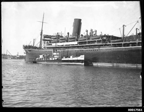 Sheel oil tanker TIGA refuelling a passenger liner, possibly RMS MOLDAVIA or MONGOLIA