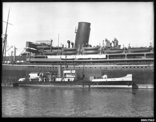 Shell oil tanker TIGA refueling a passenger liner