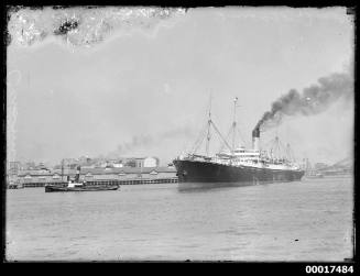 Shaw Savill & Albion Line passenger liner CERAMIC under tow in Darling Harbour