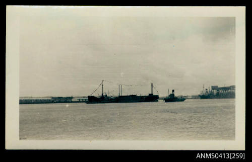 Photograph depicting port view of cargo ship KAROON