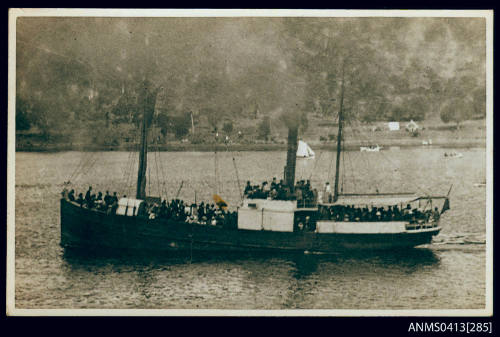 Photograph of the  small cargo ship EMU