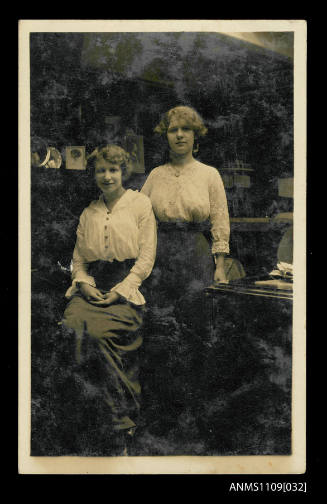 Photographic postcard of sisters Helen Dorothy and Ethel Manila Sterling on E R STERLING