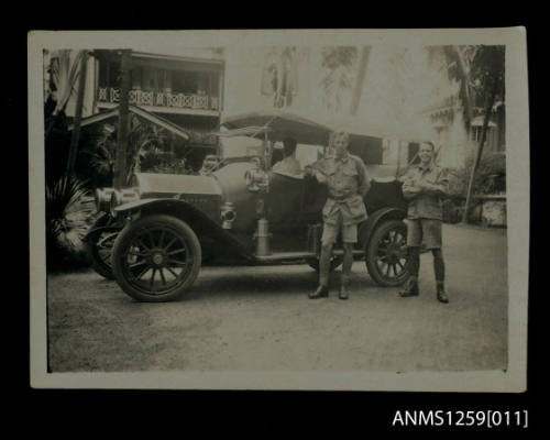 Douglas Ballatyne Fraser and friend in front of a car