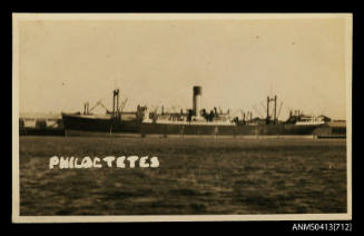 Port view of cargo ship PHILOCTETES berthed at wharf
