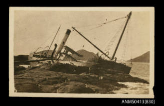 Cargo ship PAPPINBARRA aground on rocky shore 1929