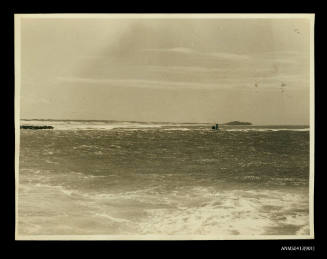 Photograph depicting a wrecked ship