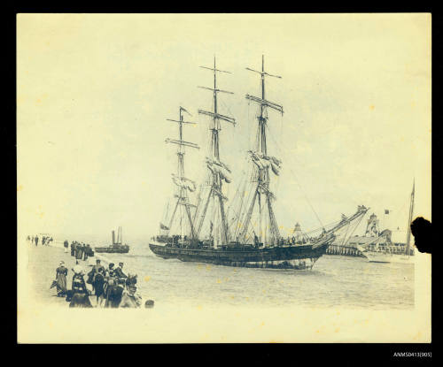 Three masted sailing ship MACCALLUM MORE being towed into port at entrance to Ostend Harbour France 1873