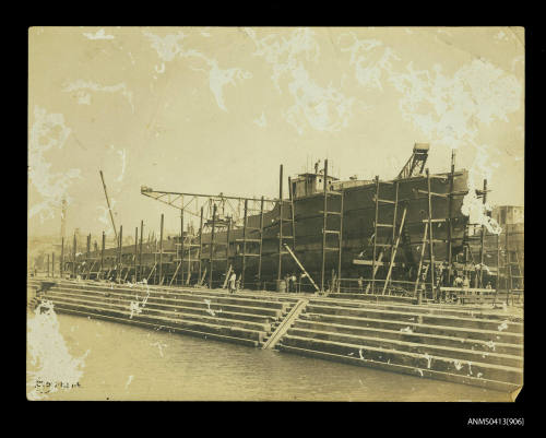 A ship under construction in dry dock