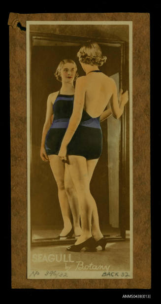 Colour photograph of a woman modelling Black Lance swimwear