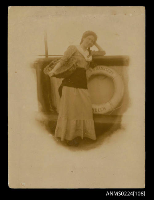 Woman with basket on SS DAMASCUS