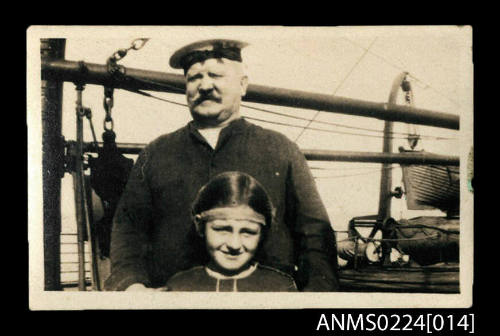 Photograph of a seaman and a child