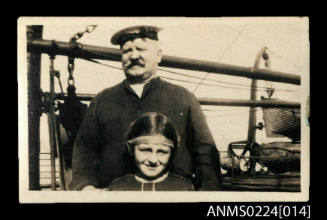 Photograph of a seaman and a child