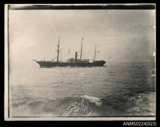 Photograph centre port view of steamer under way with single central funnel