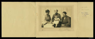 Studio portrait, of three women and child seated, at the centre: elderly woman, grey hair, long earrings Freda Wilson