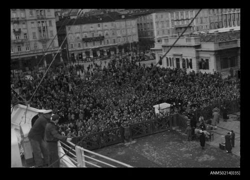 Crowds in Trieste, Italy watch as CASTEL VERDE departs transporting migrants to Australia