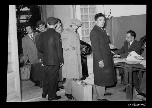 Migrants for Australia completing formalities at Trieste prior to departing for Australia