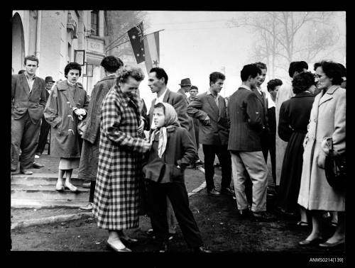 Migrant men, women and child awaiting vaccination and interviews at the ICEM Australian mission, Osijek