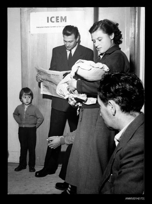 Men, women and children waiting at ICEM New Zealand mission offices