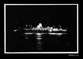 Passenger ship moored at night