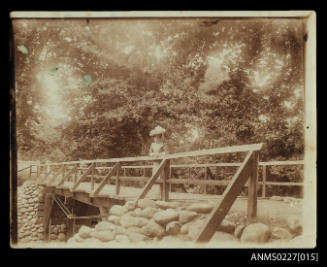 Woman on a bridge