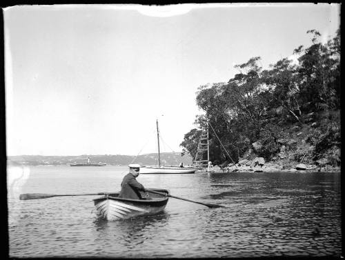 Man rowing a boat from his yacht