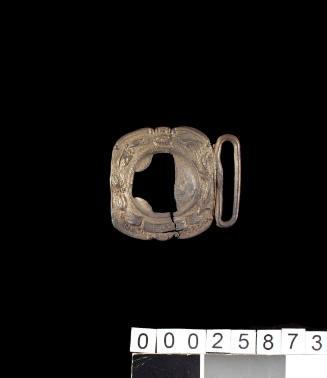 Buckle recovered from the wreck of the DUNBAR