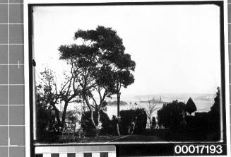 Distant view of a US Navy battleship in Sydney Harbour