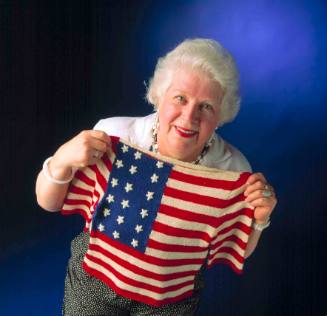 Jumper-Audrey Capuano holding her stars and stripes jumper