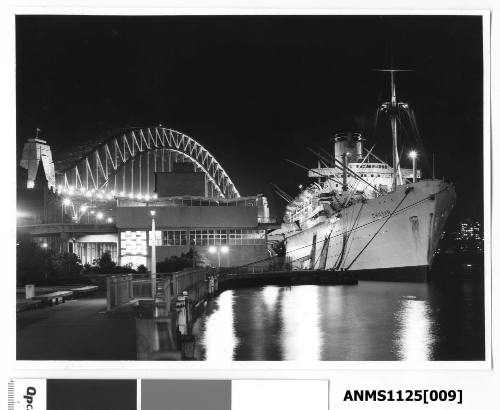 A night time view, taken from the Circular Quay Walk showing the P&O liner SS CHUSAN moored at International Terminal wharf at Circular Quay.